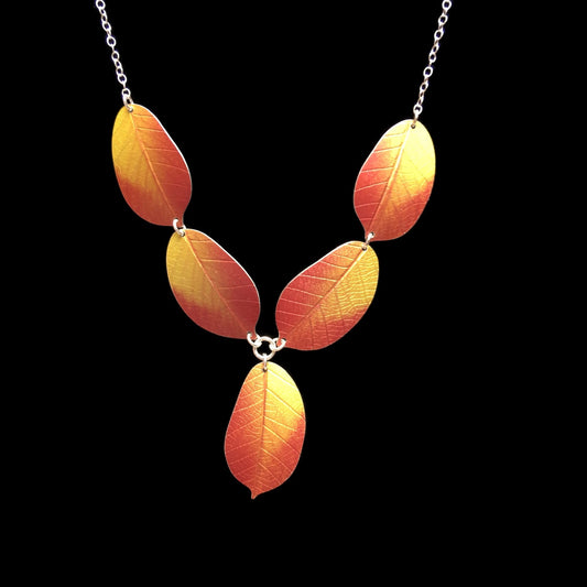 Asymmetric golden Cherry necklace by Photofinish Jewellery