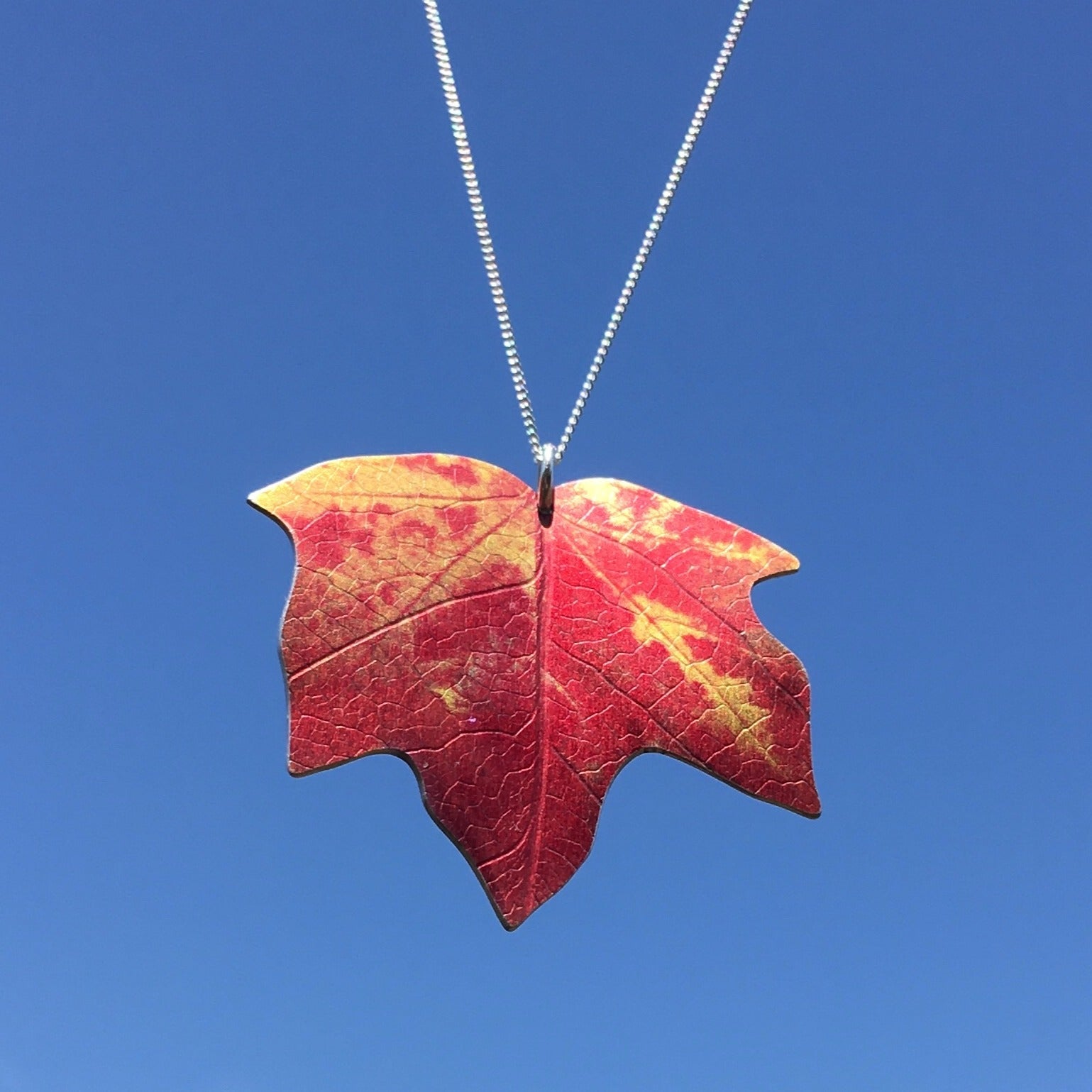 Winkworth Maple leaf necklace by Photofinish Jewellery. Red & Gold